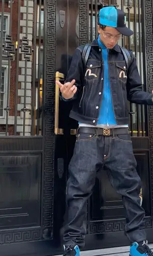 Central Cee wearing Louis Vuitton backpack