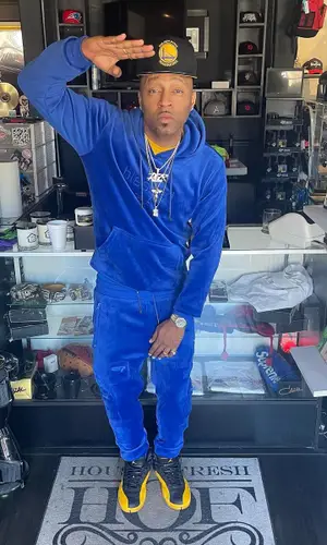 Drumma Boy wearing New Era cap
