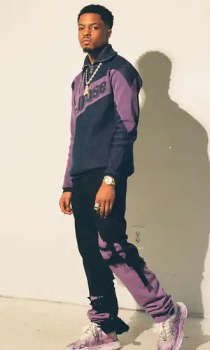 Pierre Bourne wearing Raf Simons jeans