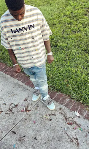 Kodak Black wearing Lanvin t-shirt