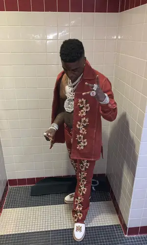 Kodak Black wearing Amiri shirt