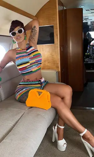 Cardi B’s Outfit in Miu Miu Eyewear, Bottega Veneta Jewelry & Giuseppe Zanotti Sandals (2022)