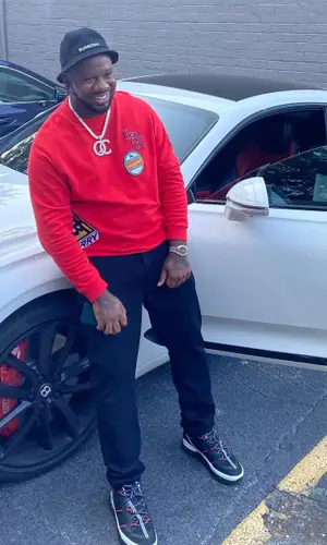 Pierre P Thomas wearing Burberry sneakers