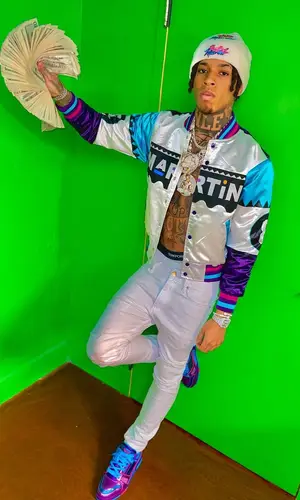 NLE Choppa wearing Headgear Classics jacket