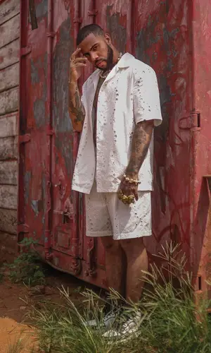 Vic Mensa wearing Daily Paper shirt