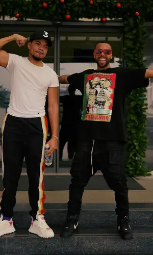 Vic Mensa wearing Nike sneakers