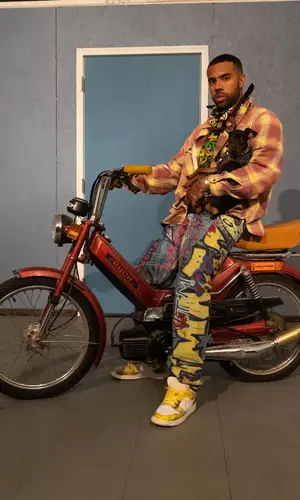Vic Mensa wearing Vetements jeans