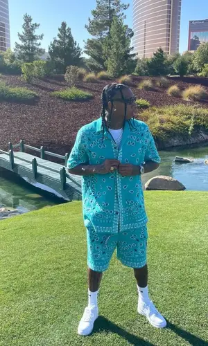 Tyga wearing Alanui shirt