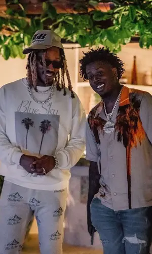 Future wearing Blue Sky Inn sweatshirt