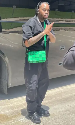 Fivio Foreign wearing Bottega Veneta bag
