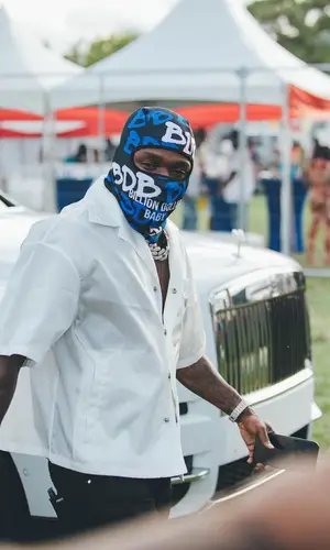 DaBaby wearing Prada shirt