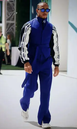 Lewis Hamilton wearing Louis Vuitton trousers