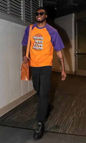 Thanasis Antetokounmpo wearing Warburton pants