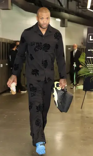 PJ Tucker wearing Louis Vuitton shirt
