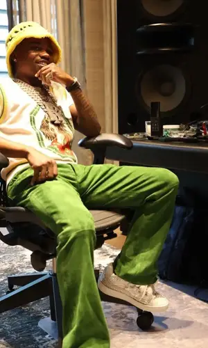 Roddy Ricch wearing Palm Angels sweater