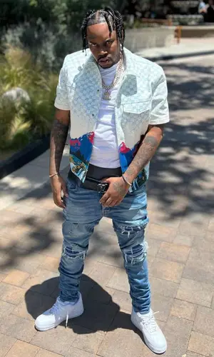Fivio Foreign wearing Louis Vuitton shirt