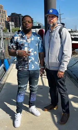 Rowdy Rebel’s Outfit in Prada Shirt, Amiri Jeans & Nike Sneakers (2022)
