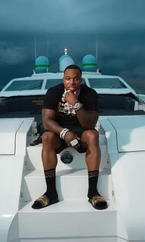 BandMan Kevo wearing Fendi shorts