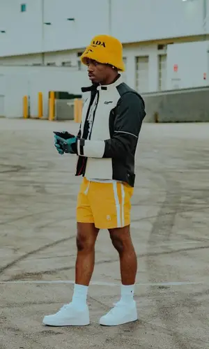 Roddy Ricch’s Outfit in Can-Am Jacket, Polo Ralph Lauren T-Shirt & Prada Hat (2022)