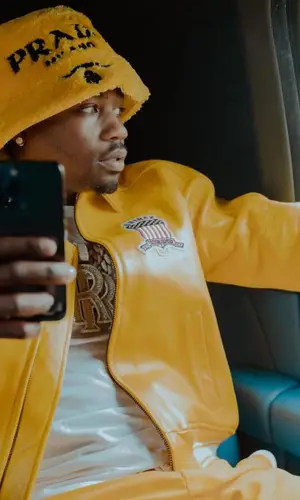 Roddy Ricch wearing Avirex jacket