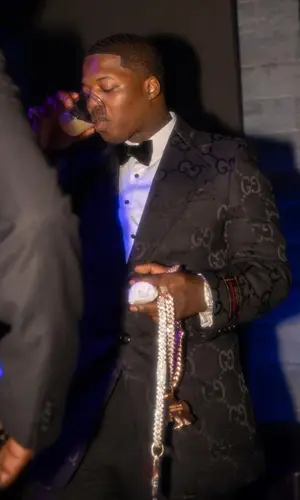 Lil Zay Osama wearing Gucci jacket