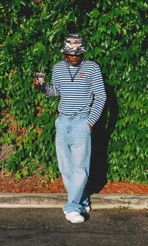 CKay wearing Crocs sandal