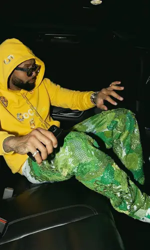 Odell Beckham Jr’s Outfit in Chanel Hoodie, Nike Sneakers & Pharrell Williams (2022)