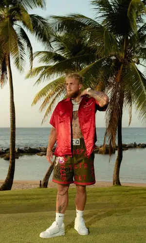 Jake Paul wearing Gucci shirt