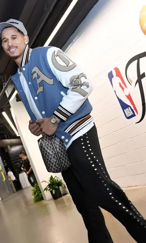 Juan Toscano-Anderson’s Outfit in Menace Jacket, Nike Sneakers & Sworn To Us Cap (2022)