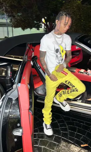 Swae Lee wearing Louis Vuitton backpack