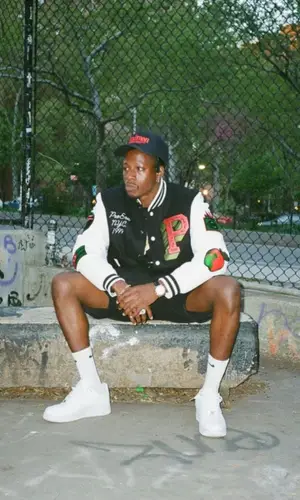 Joey Badass wearing Pro Era jacket