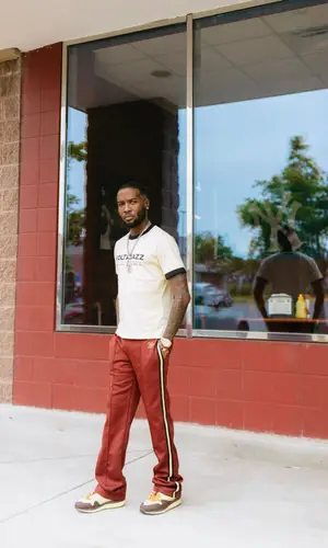 Shy Glizzy wearing Nike sneakers