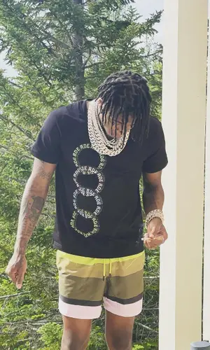 NBA YoungBoy wearing Dries Van Noten shorts