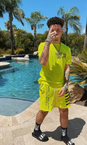 Lil Mosey wearing Amiri sandal
