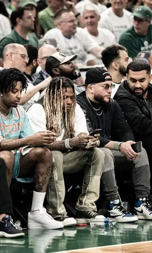 21 Savage wearing Louis Vuitton shorts