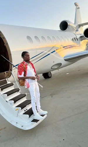Soulja Boy wearing Louis Vuitton eyewear