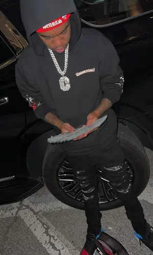 Lil Poppa wearing Chrome Hearts hoody