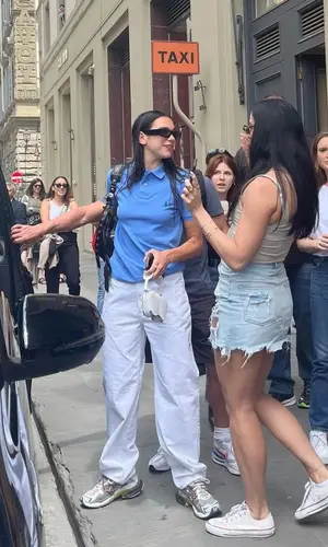 Dua Lipa wearing Ralph Lauren shirt