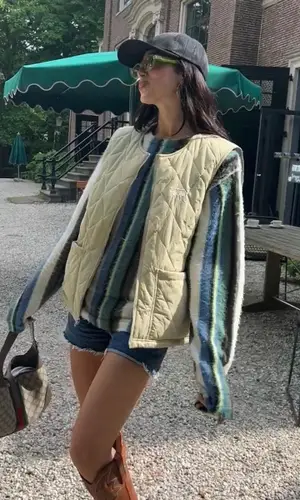 Dua Lipa wearing Stussy sweater