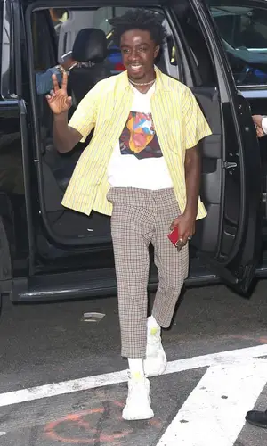 Caleb McLaughlin wearing Hugo Boss sneakers