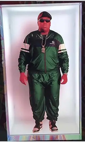 The Notorious B.I.G. wearing Sergio Tacchini suit