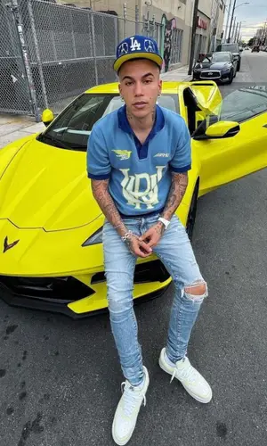 Sfera Ebbasta wearing Zara shirt