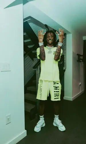 Ja Morant wearing Amiri shorts