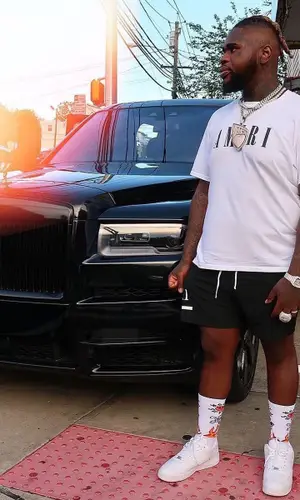 Fat Boy wearing Amiri t-shirt
