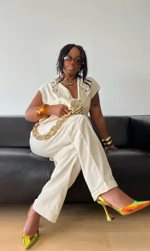 De'arra Taylor wearing Amina Muaddi sandal