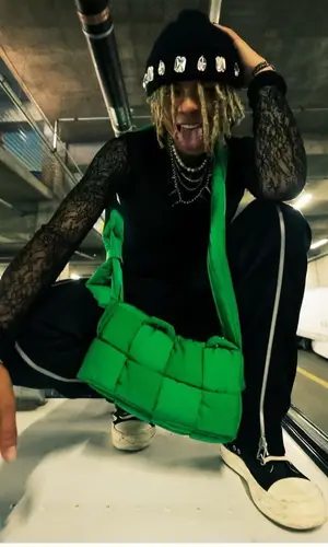 Iann Dior wearing Bottega Veneta pants
