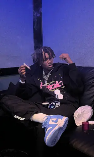 Onlybino wearing Spider Worldwide hoody