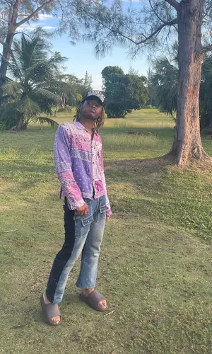 TyFontaine wearing Kapital shirt