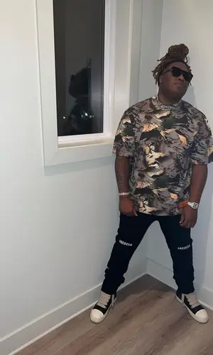 Tay Keith’s Outfit in Heron Preston T-Shirt, Rta Jeans & Rick Owens Sneakers (2022)