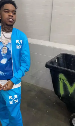 Lil Poppa wearing Gallery Dept. cap